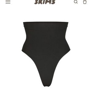 Skims thong shape wear. Never worn with skins bag
